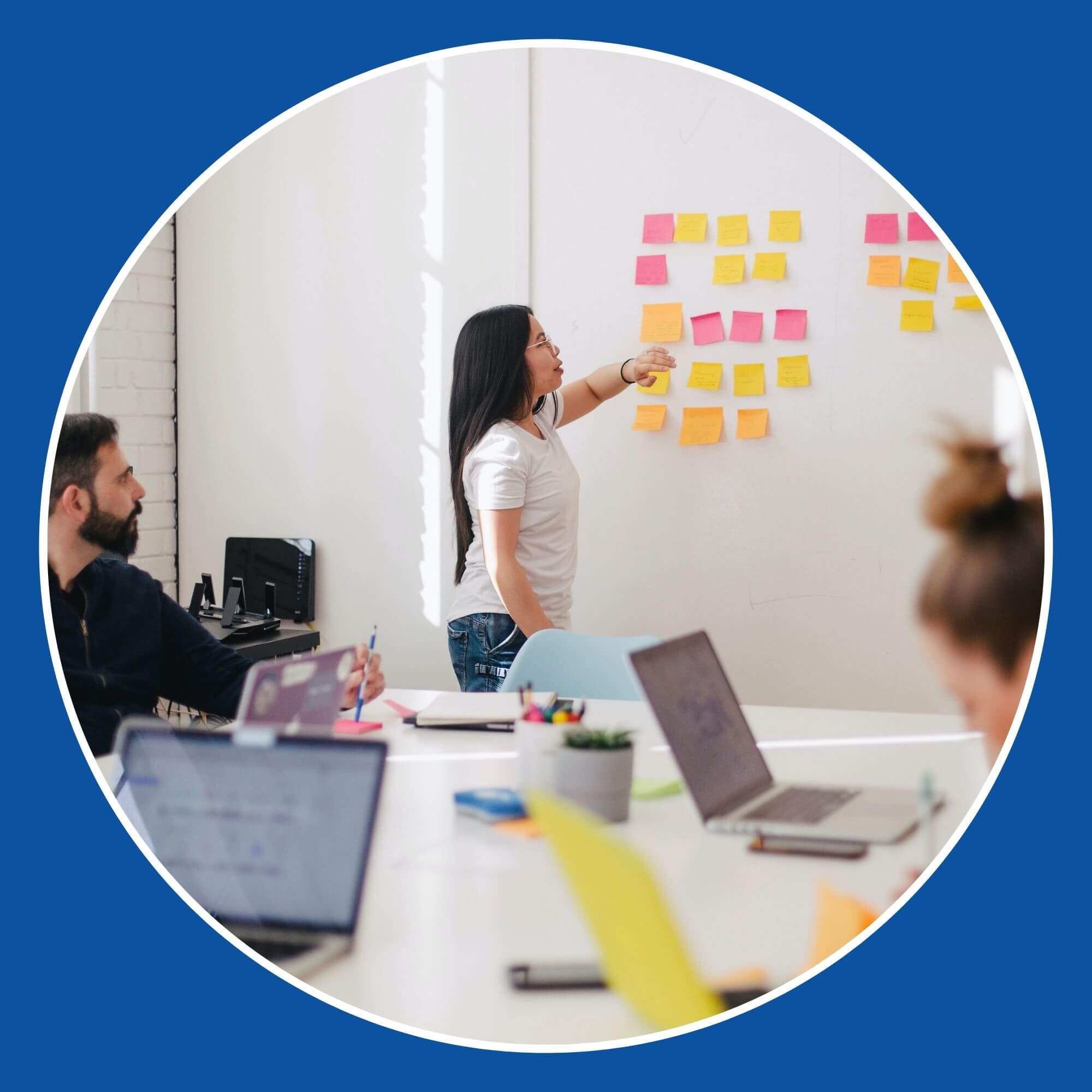 Photo showing a group of people attending training in a meeting room. Image from Unsplash (Photographer - Jason Goodman)